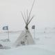 Tipis in the snow at Oceti Sakowin. All photos by Tod Seelie for Jezebel